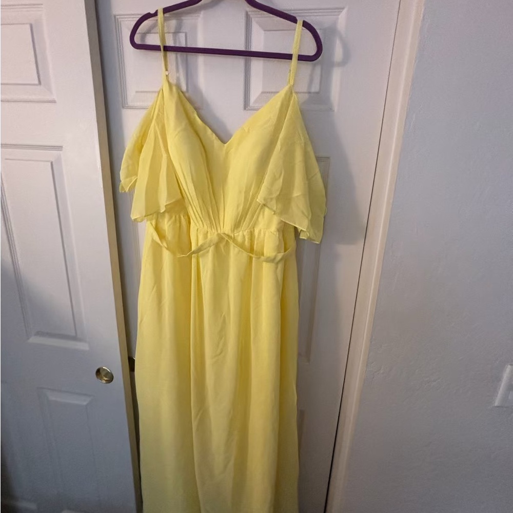 Yellow size 18 gown with lace up back.